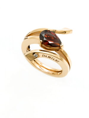 Damiani pink gold ring with garnet and diamond