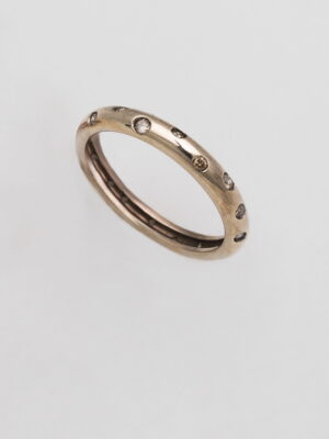 Alfieri & St.John yellow gold wedding band with white and brown diamonds