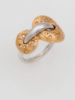 Nanis yellow and white gold ring with white diamonds